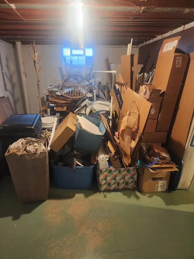 Roll-off dumpster container at job site for Concrete Dumpster Rental in Sandy Creek